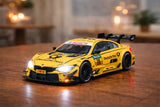 D-Power 1:32 Die-Cast BMW M4 DTM 2017 Deutsche Post #16 Race Car with Lights & Sound