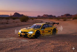 D-Power 1:32 Die-Cast BMW M4 DTM 2017 Deutsche Post #16 Race Car with Lights & Sound