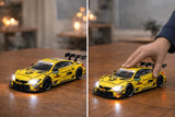 D-Power 1:32 Die-Cast BMW M4 DTM 2017 Deutsche Post #16 Race Car with Lights & Sound