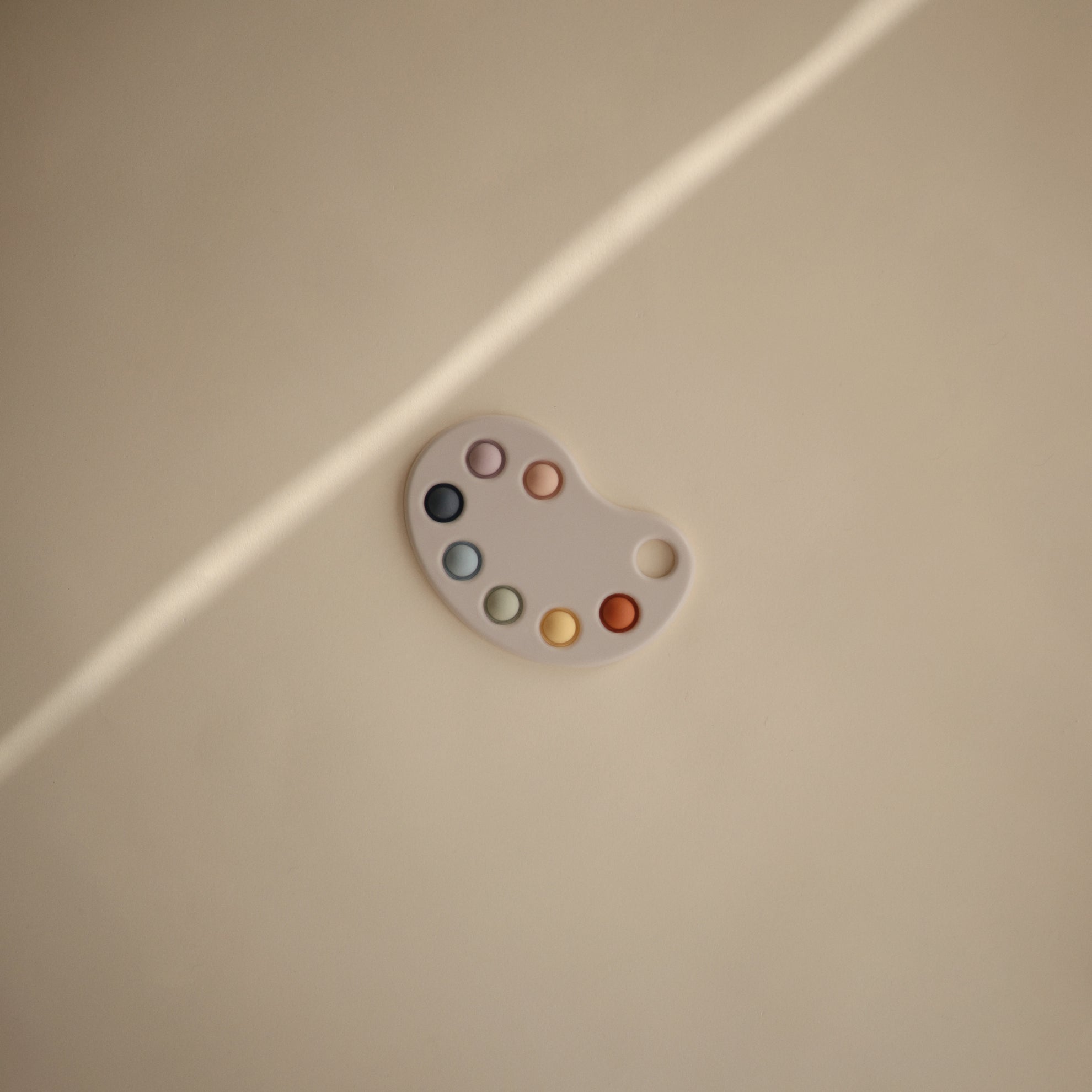 Mushie Paint Palette Press Toy (Multi) - Laadlee