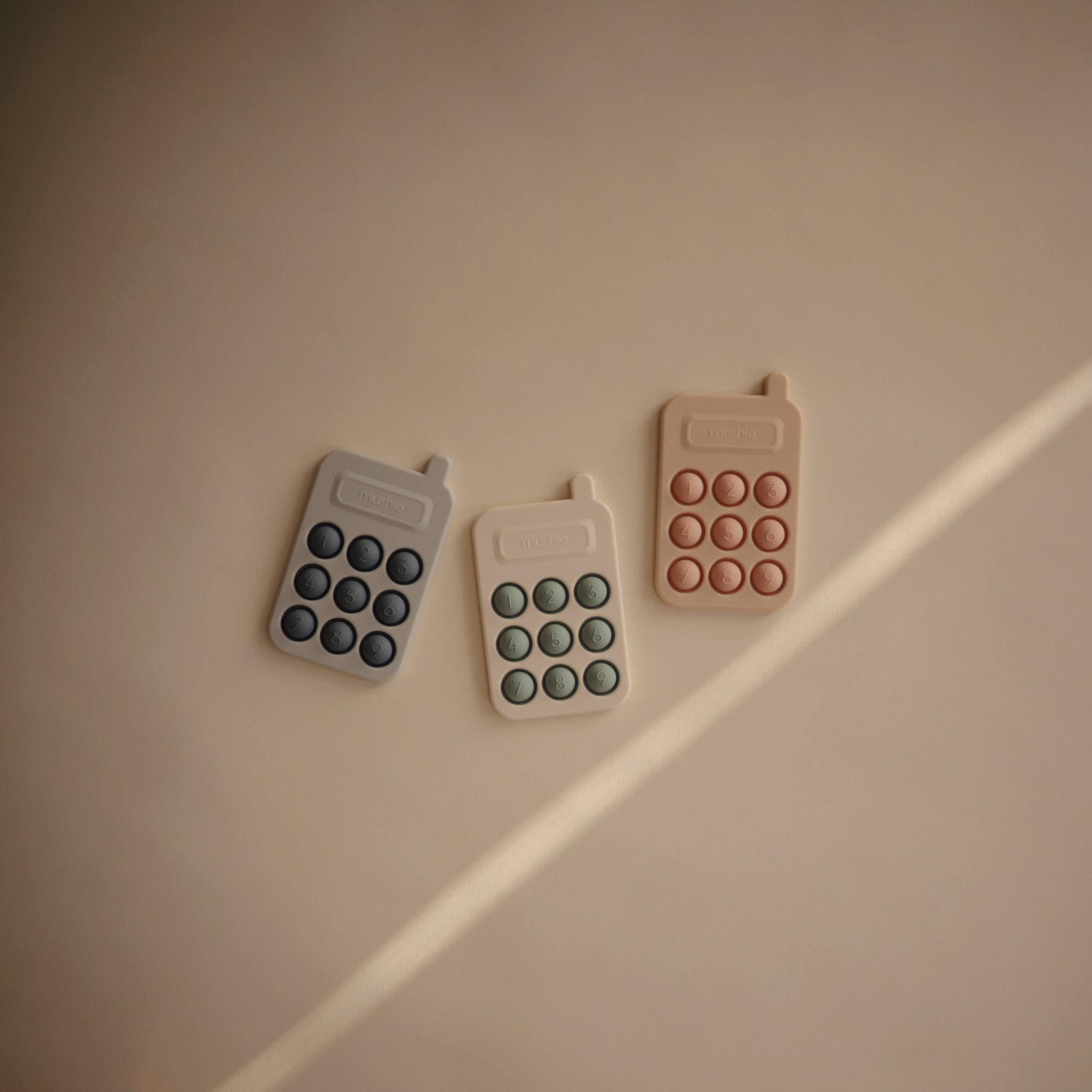 Mushie Phone Press Toy Blush - Laadlee